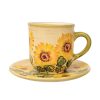 Kaffeetasse und kleiner Teller sonnenblume