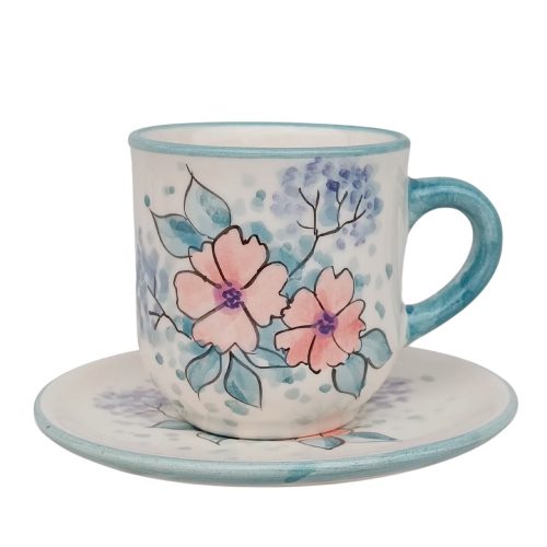 Kaffeetasse Wildblume in der Dämmerung und kleiner Teller