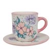 Kaffeetasse Wildblume in der Dämmerung und kleiner Teller