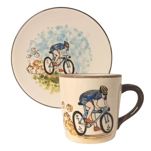 Tasse und Frühstücksteller Junge auf dem fahrrad